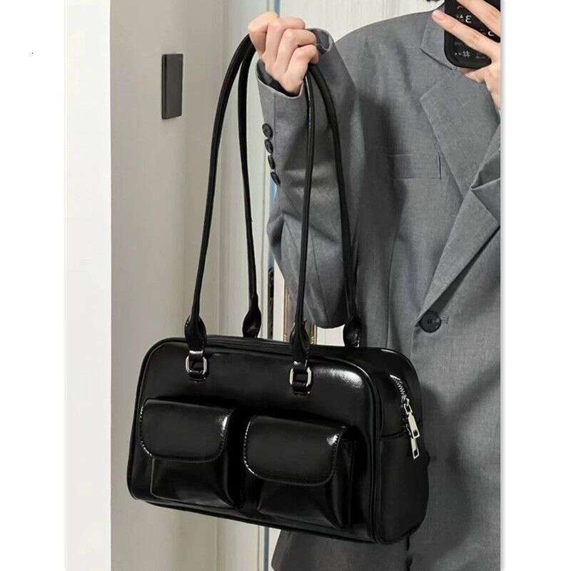 2025 niche design oil wax leather bowling with multiple pockets casual armpit bag commuting hand-held shoulder bag