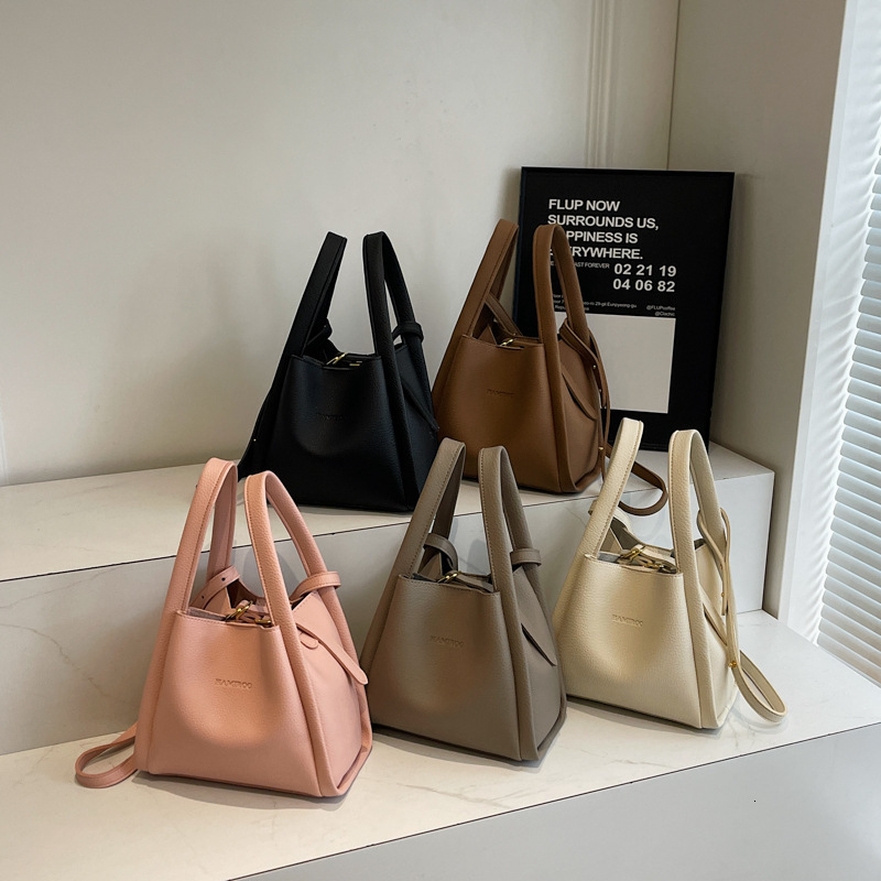 2025 Spring New Designer Bag New Women's Fashion Lychee Pattern Soft Leather Bucket Simple Multi functional Commuter Single Shoulder Maternal and