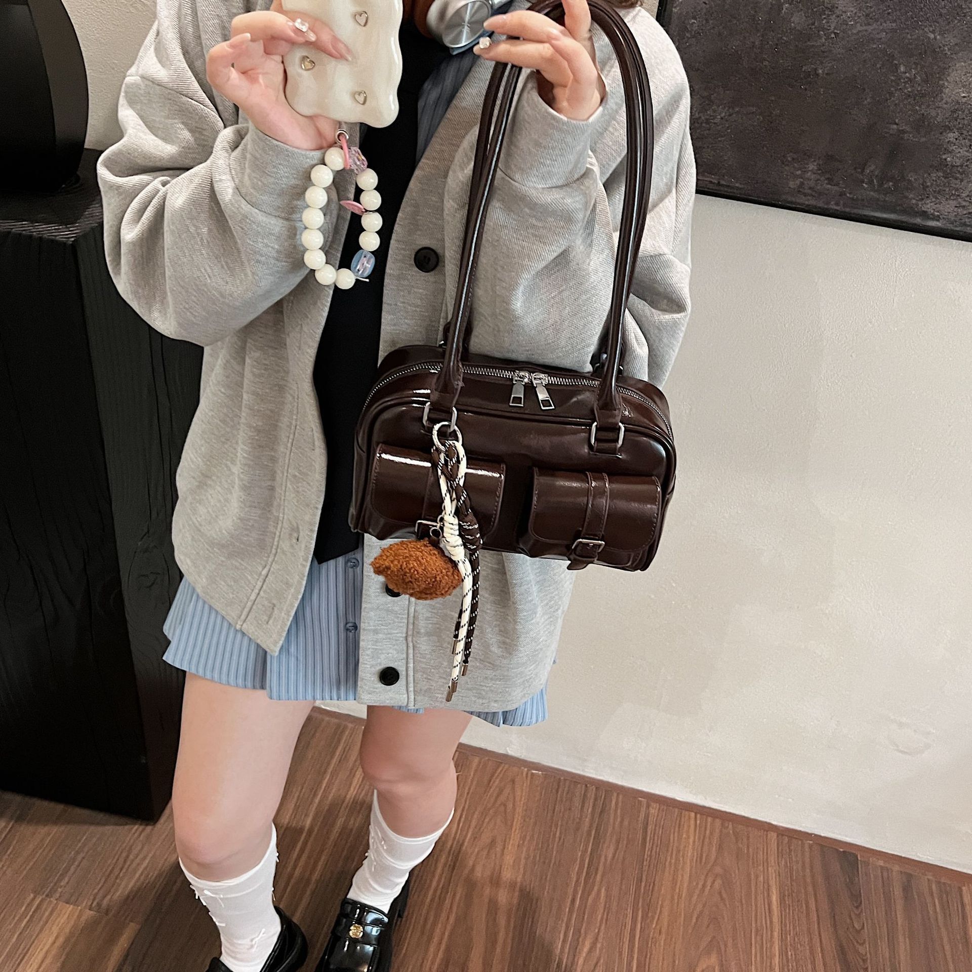 25 year black swan pillow bag, women's new style, light luxury, niche pu, high-end feeling, hand-held bill of lading shoulder bag