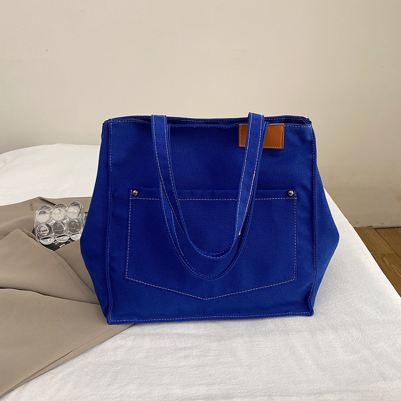 Fashion New Free Delivery Designer Luxury Bag Bag Canvas Handbag Women's Large Capacity Casual Shoulder Commuting Bag