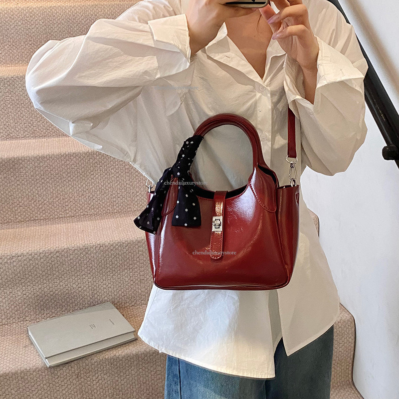 2025 Free Shipping Designer Women's Bag Fashion Handbag New Korean Version Casual Belt Metal Buckle Simple Shoulder Bag Red Phone Bag Student Bag