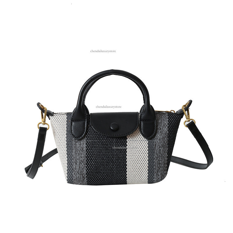 2025 Free Shipping Designer Women's Bag Shoulder Bag Summer New Tote Pattern Handbag High Quality Fashion Casual Crossbody Bag Makeup Bag
