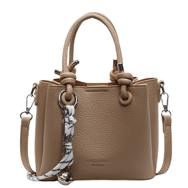 New bag for spring and summer casual women's small tote bag 2025 new large capacity designer single shoulder commuting crossbody bag, simple hand