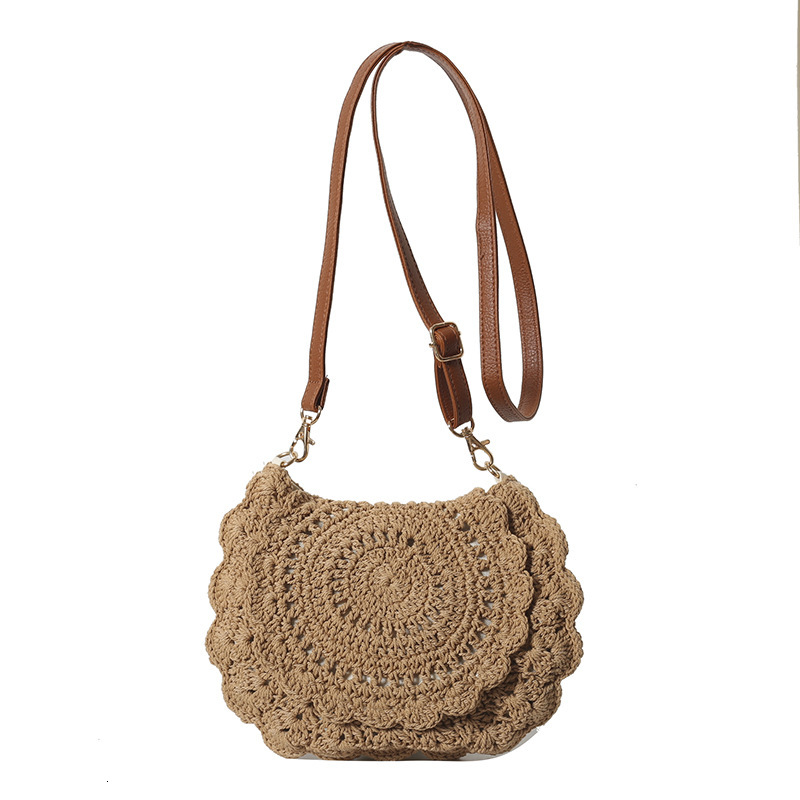 2025 new bag lace slanted body cotton thread hollow out single shoulder grass woven vacation style beach bag designer multifunctional women's bag