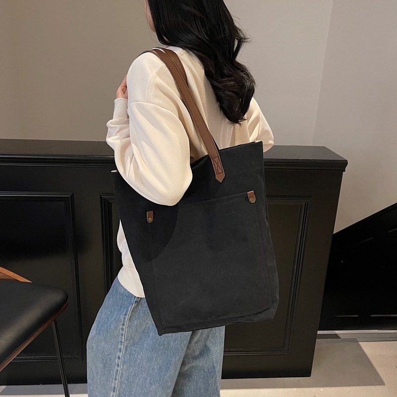 Canvas men's large capacity handheld 2025 new fashion spring simple shoulder bag versatile casual tote for women