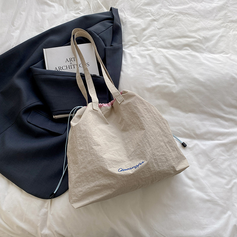 Casual Simple Canvas 2025 Spring And Summer New Free Delivery Designer Luxury Bag Bag Large Capacity Korean Edition Tote Fashion Trend Shoulder Bag Fo