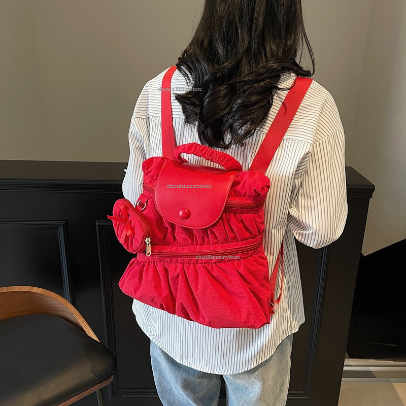 2025 Free Shipping Designer Bag Women's Backpack Sweet And Fashionable Pleated Skirt Handbag Campus Student Backpack Outdoor Travel Vacation Back