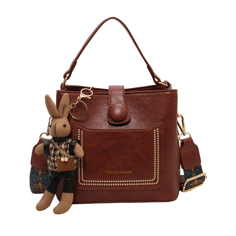 2025 New Free Delivery Designer's Bag Small Niche Design For Women Spring New Popular Wide Shoulder Strap Crossbody Versatile Hand-held Bucket Ba