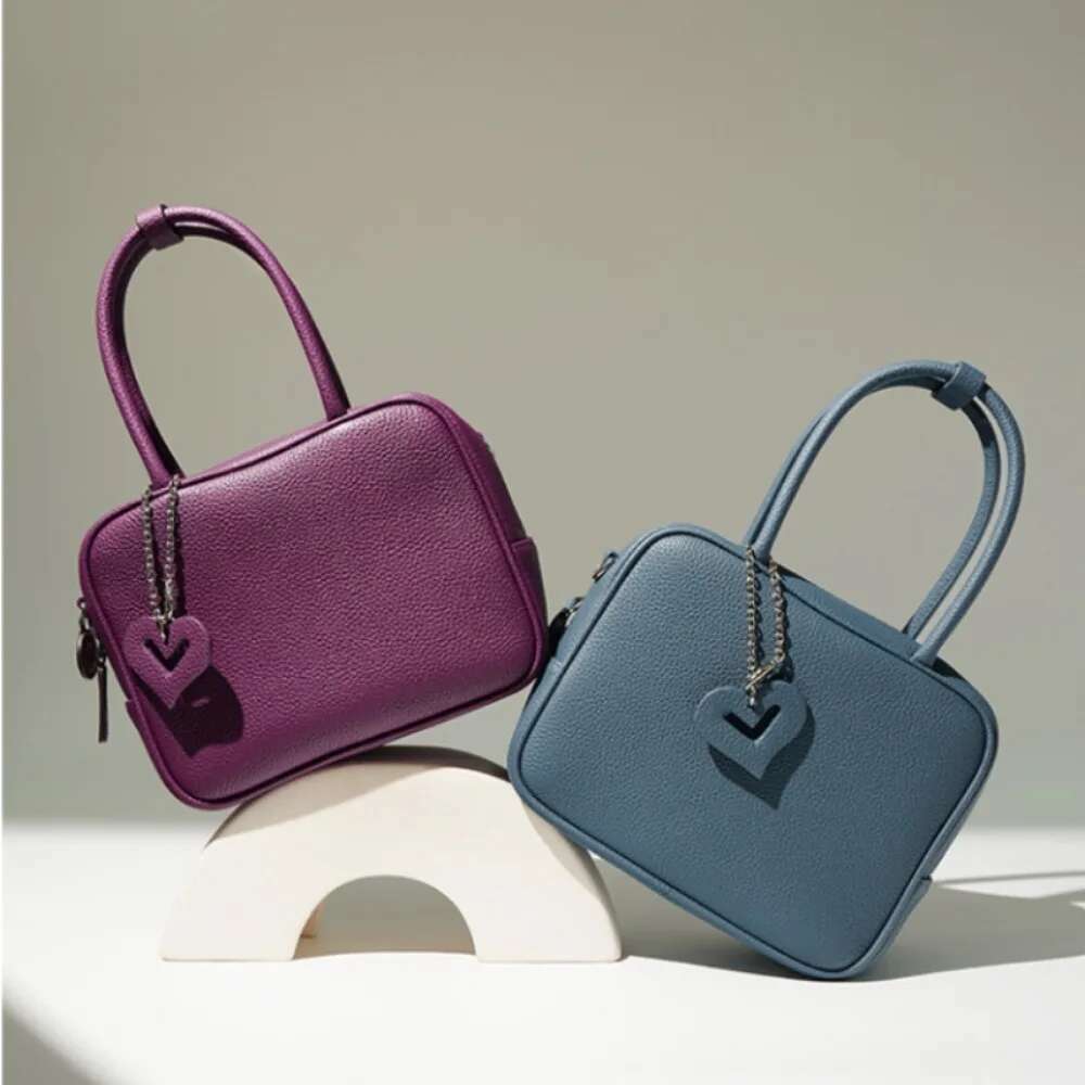 Designer Bag 2025 Elegant Solid Texture Commuter Roft Crossbody Bags Lovely Pendant Braid Sweet Exquisite Shoulder New Moda Women Handbags Luxury Bag