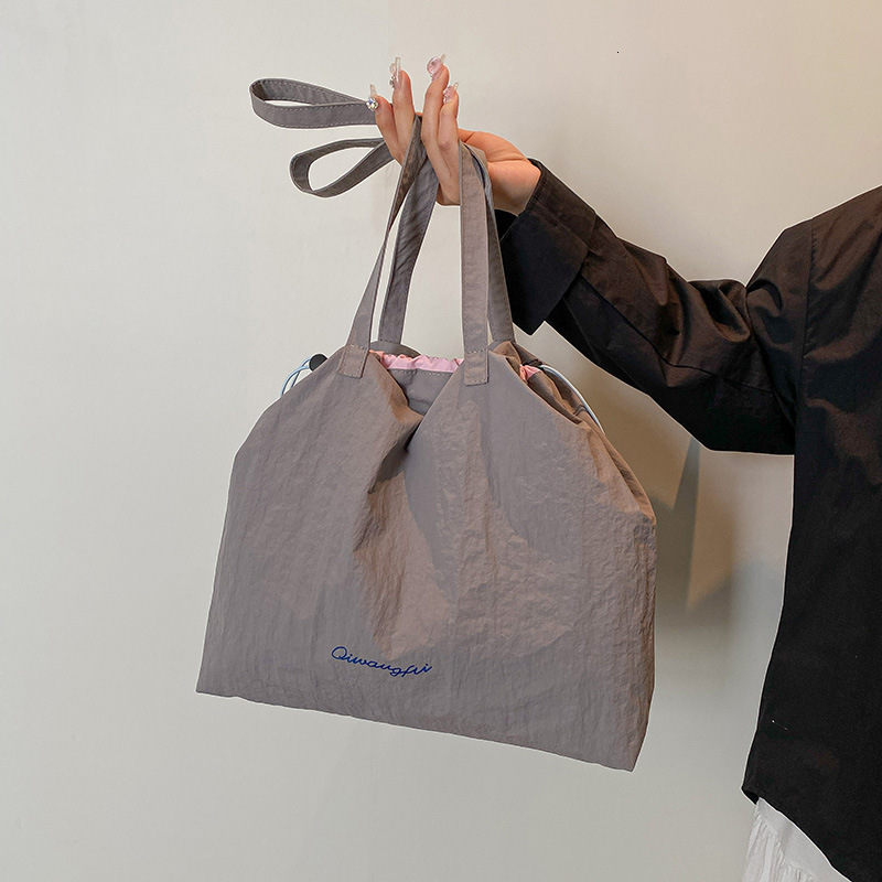 Casual Simple Canvas 2025 Spring And Summer New Free Delivery Designer Luxury Bag Bag Large Capacity Korean Edition Tote Fashion Trend Shoulder Bag Fo