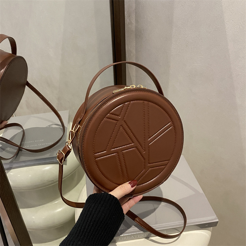 Fashion Indentation Diamond Grid Round Luxury Bag New Free Delivery Designer Bag Cake Handbag Simple Women's 2025 Spring/summer New Korean Versio