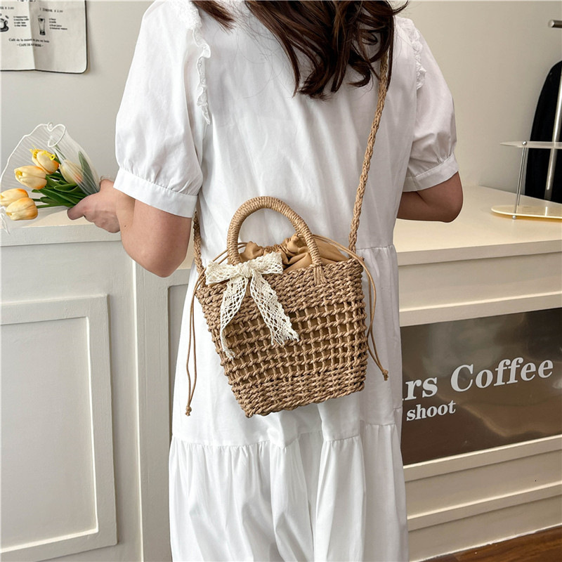 New bag small fresh straw women's 2025 new beach vacation designer woven handbag multifunctional shoulder crossbody bag