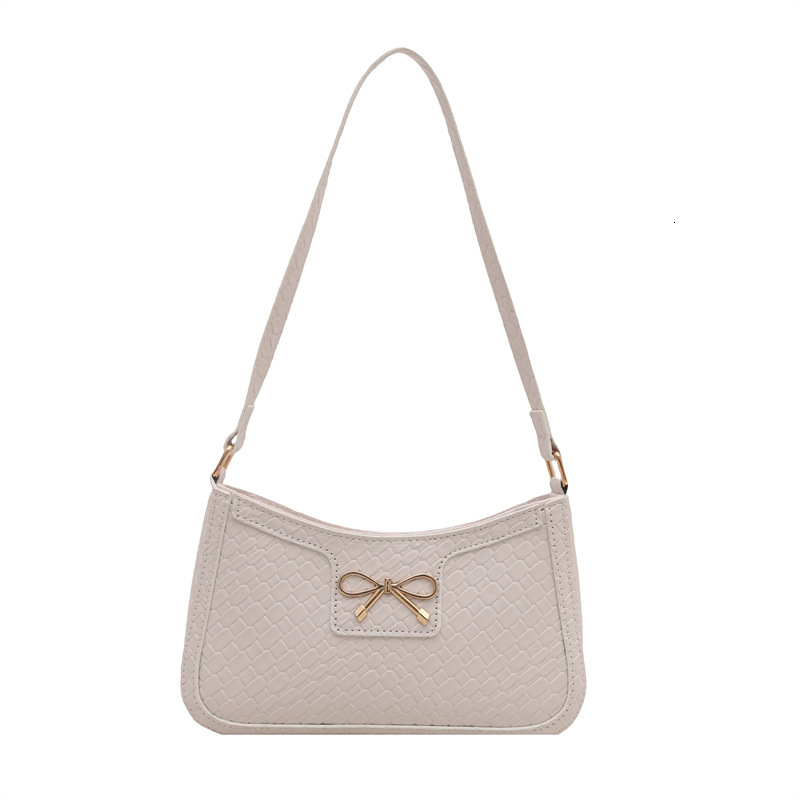 Sweet Girl Heart New Free Delivery Designer Bag Weaving Pattern 2025 Spring New Simple Fashion Western Luxury Bag Style Bow Armband Shoulder Bag Premi