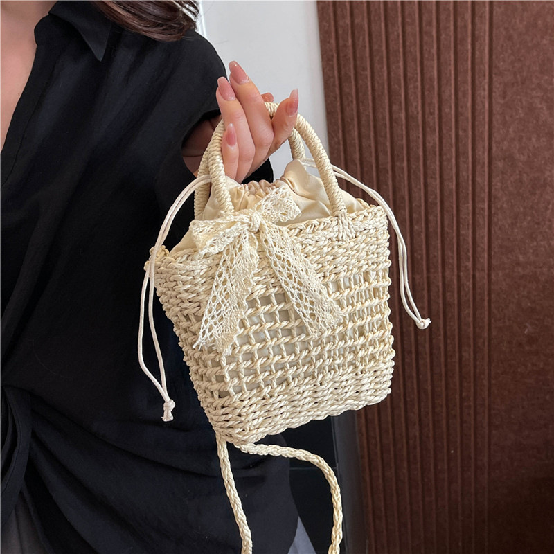 New bag small fresh straw women's 2025 new beach vacation designer woven handbag multifunctional shoulder crossbody bag