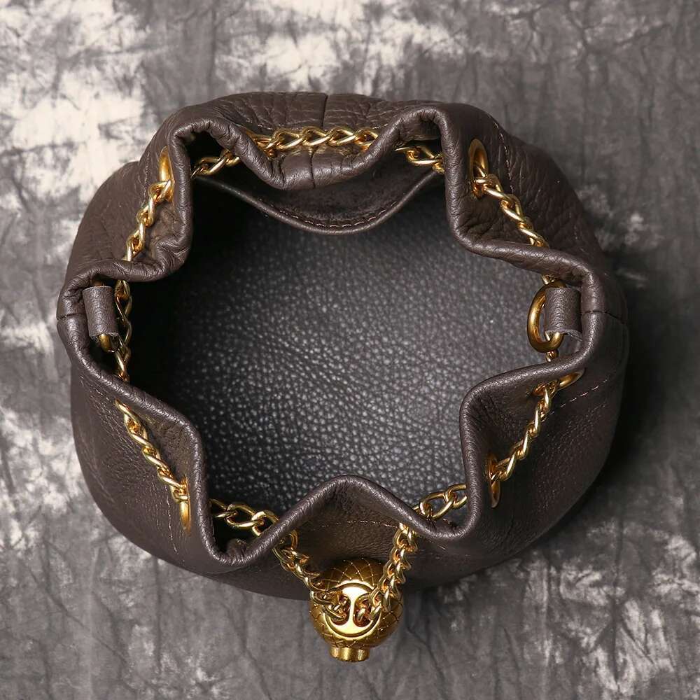 2025 New hand-made first layer cowhide makeup Fashion casual bucket high-quality soft leather chain bag