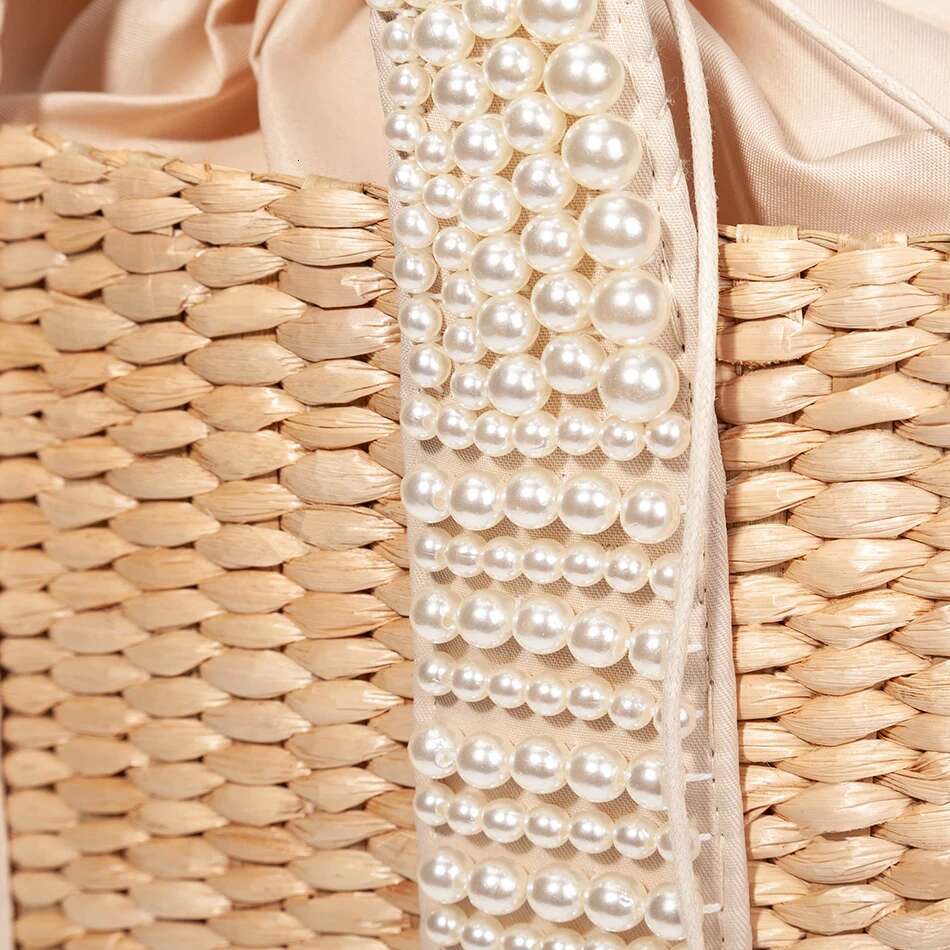 2025 Free Shipping New Women's Designer Elegant Knitted Beaded Straw Bag Women's Bohemian Knitted Large Handbag Holiday Leisure Beach Bag