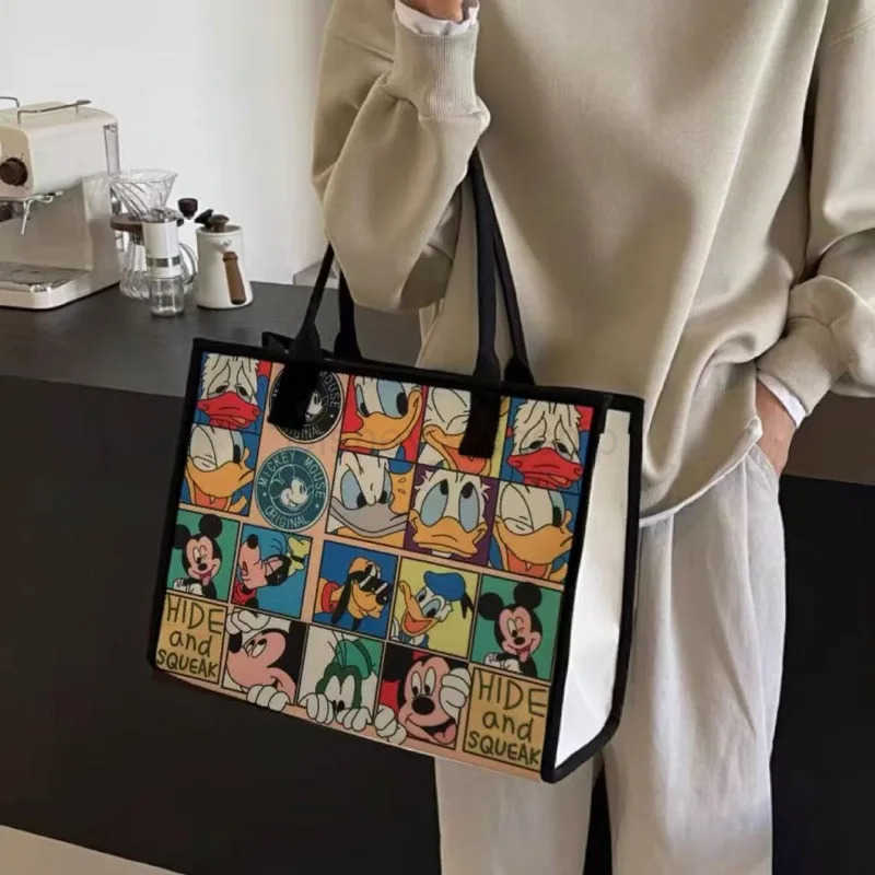 Disney 2025 Disney New Mickey Pluto Large Capacity Womens Canvas Bag Cartoon Casual Shoulder Commuting Mummy BagXJ250515