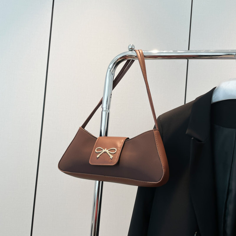 Free Delivery Designer Bag Popular Niche Bow Women's 2025 Winter New Versatile Hand Texture Stick Single Shoulder Armpit Luxury Bag