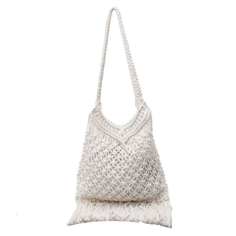 Hollow out cotton thread for women 2025 summer new tassel grass woven bag, vacation style beach versatile armpit shoulder bag