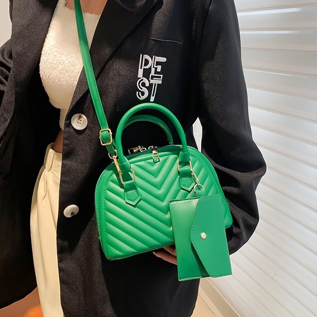 Top Brand High-quality New Free Designer Bag 2025 Summer Multifunctional Women's Striped Shell Bag Women's Temperament Fashionable Letter Sh