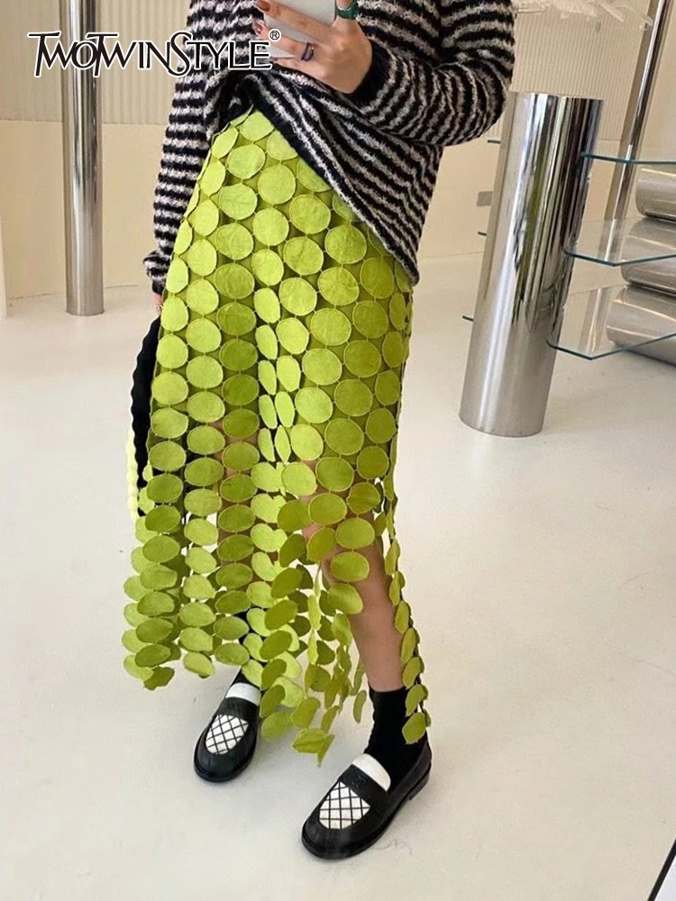 TWOTWINSTYLE Cut Out Skirt For Women High Waist Patchwork Tassel Irregular Hem Solid Midi Skirts Female Summer Clothing Style 250515