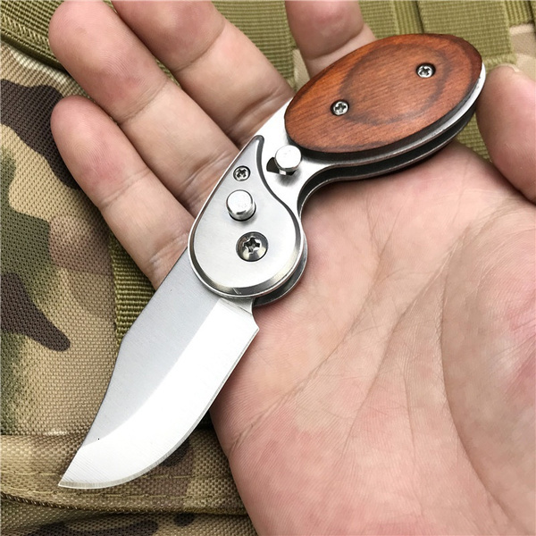 Spring Assist Knife Auto side jump Portable Survival Dagger Tactical folding pocket knife Speed Safe Assisted Opening knives MINI outdoor hunting tact
