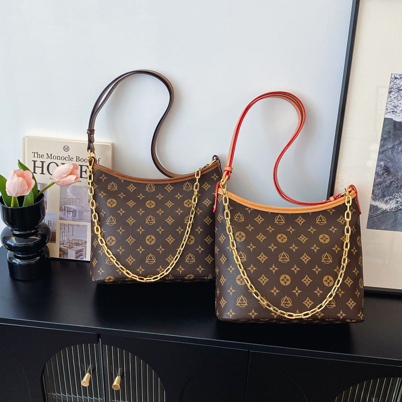 Free shipping 2025 new designer bag fashionable commuting large capacity bucket bag premium texture printed single shoulder diagonal cross bag for wom