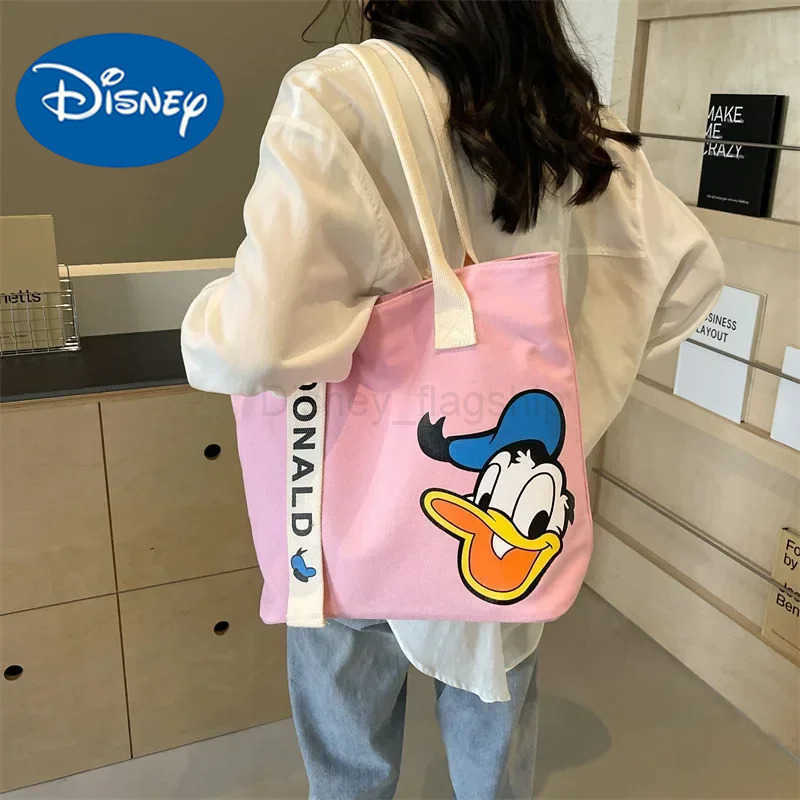 Disney Mickey Mouse New Large Capacity Cute Canvas Shoulder Bag Womens Cartoon handbag Cute storage Tote Bag Fashion MummyXJ250515