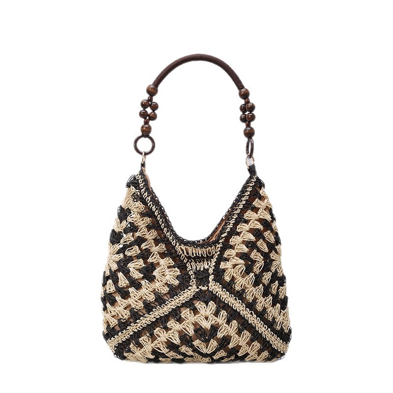 Hollow out fashionable casual grass armpit women 2025 summer new large capacity woven shoulder bag for work and commuting