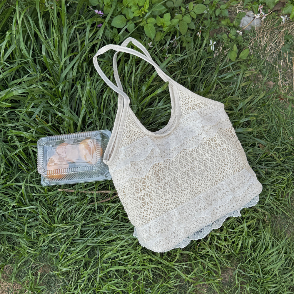 2025 new spring and summer leisure vacation fairy shaped lace mesh underarm large capacity single shoulder women's bag beach vacation bag trend h