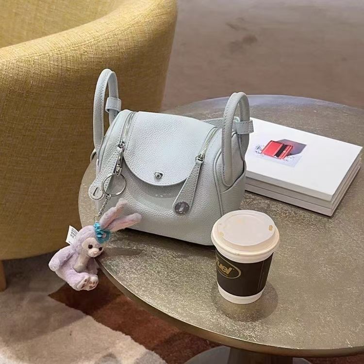 2025 new lychee grain cowhide womens bag large leather single shoulder crossbody bag silver buckle pillow tote bag versatile commuter handbag