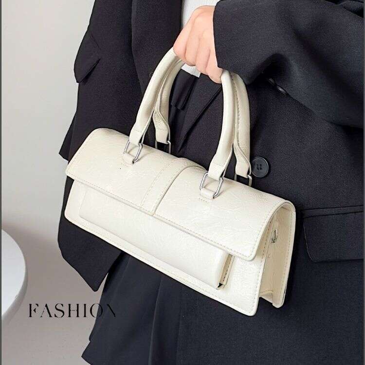 Niche 2025 new high-end crossbody handbag shoulder motorcycle ins Japanese Korean French stick bag