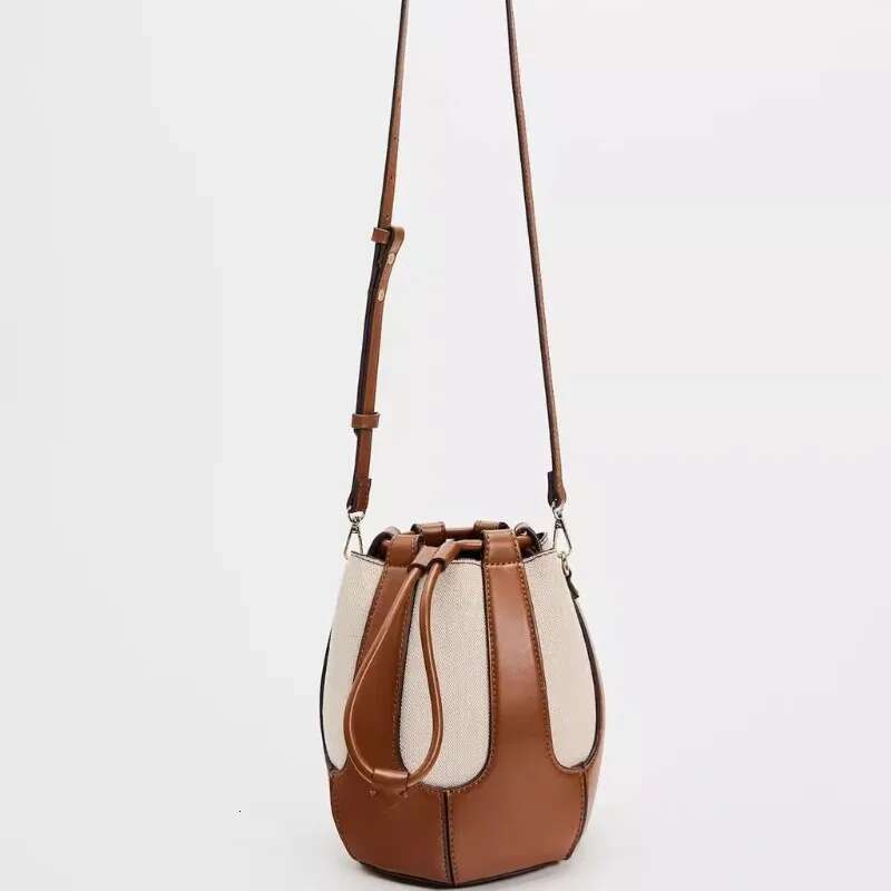 2025 New Canvas Contrasting Splicing Bag, Single Shoulder Commuting Crossbody Bucket Bag