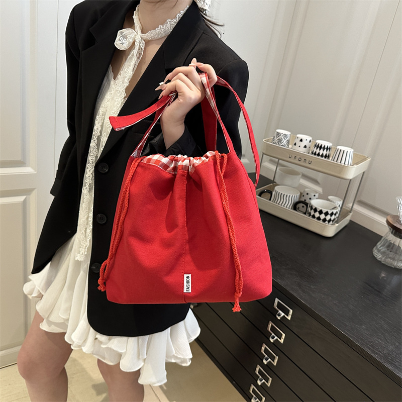 New bag multifunctional 2025 new fashionable drawstring designer handbag commuting leisure student single shoulder women's crossbody bag