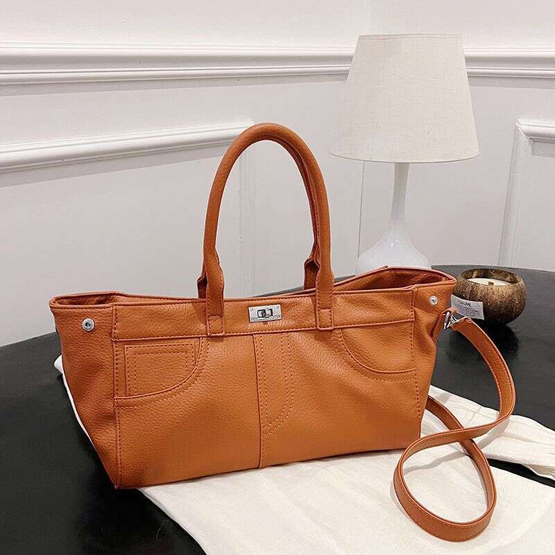 Bag 2025 autumn new item light luxury niche high-end hand-held large capacity fashionable commuting women's bag single shoulder crossbody bag