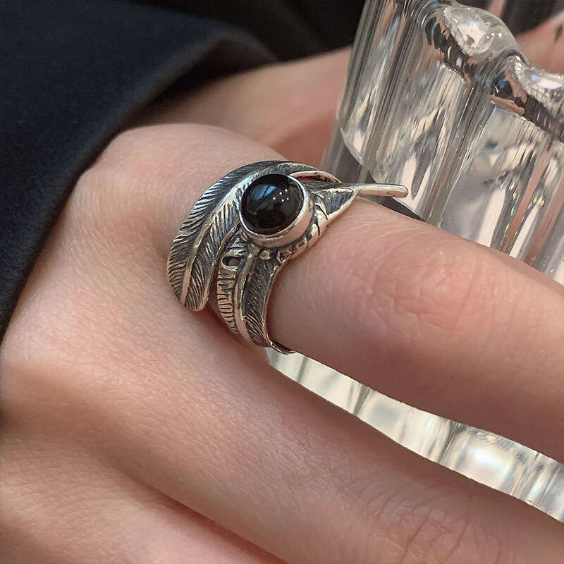 Hot selling Pupil Feather Open End Ring with Cold and Individualized Design