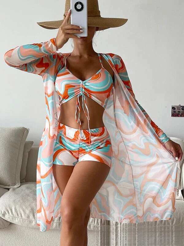Mingyi's multi colored European American mesh cover shirt fashionable sexy, leg length shorts three piece set. It women's swimsuit with vers