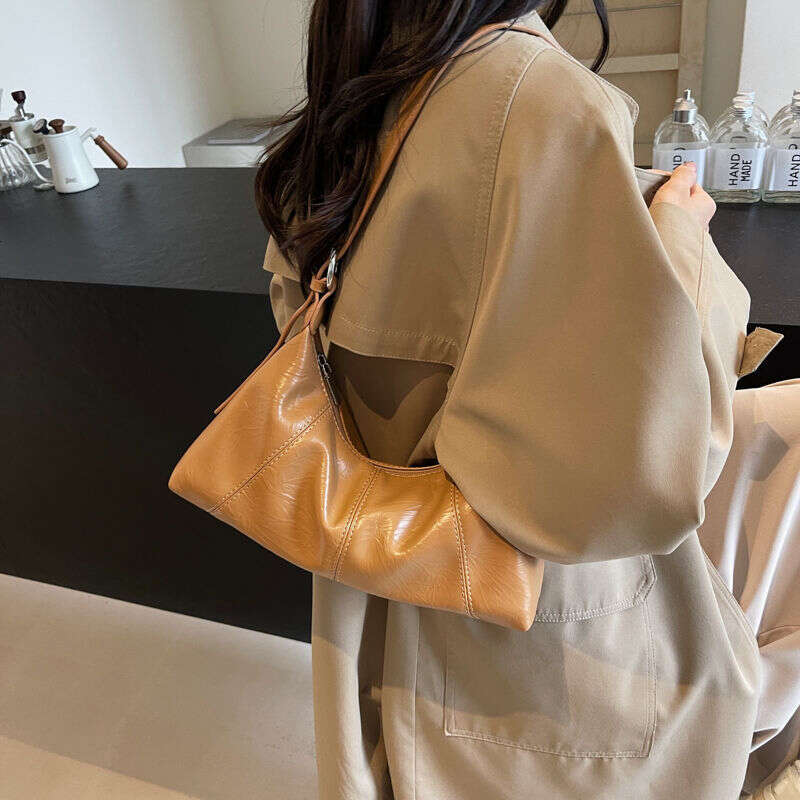 version female new item niche design casual simple high-end feeling armpit style stick bag single shoulder crossbody bag