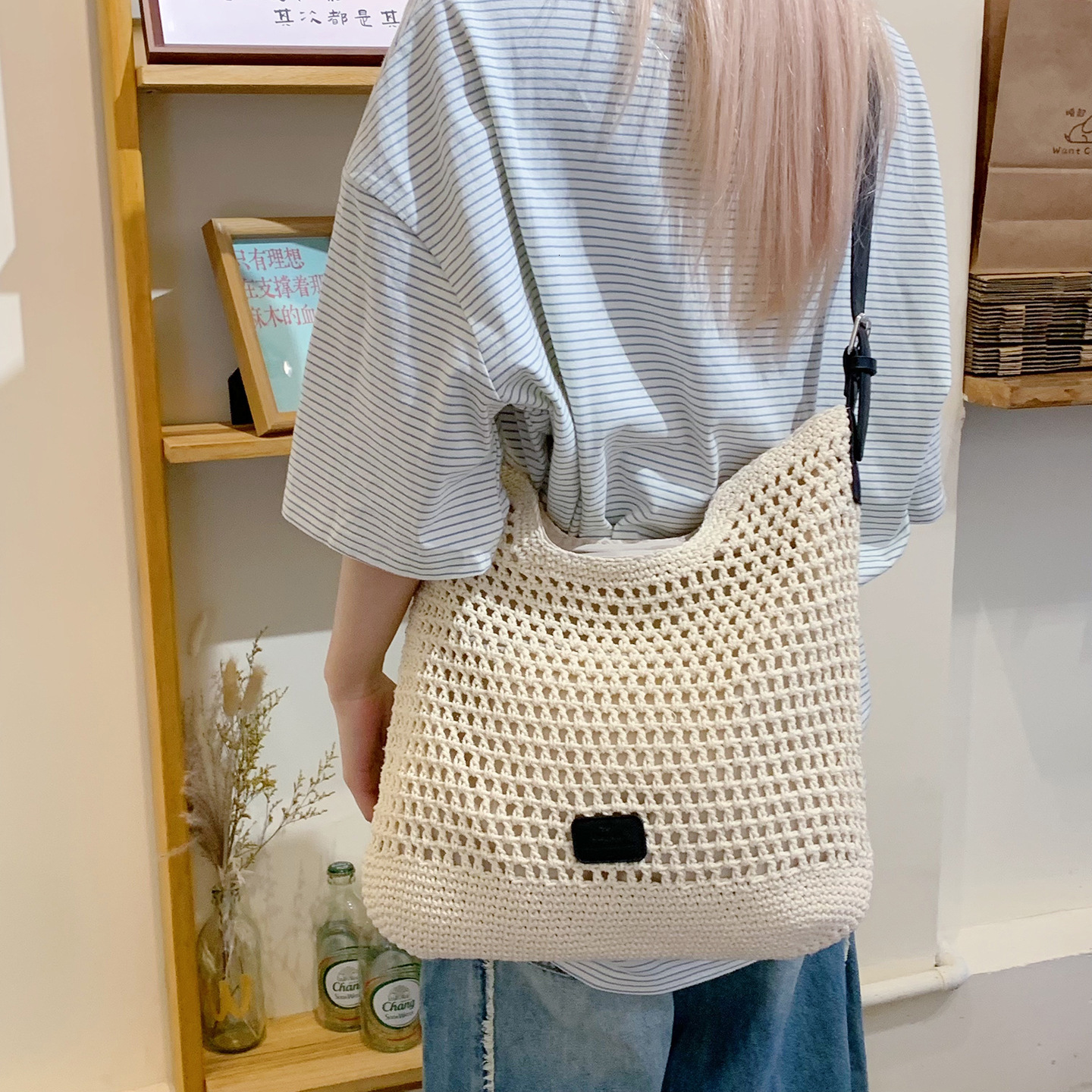 2025 new hollow woven large capacity forest lazy feng shui bucket for women, simple vacation style single shoulder crossbody bag
