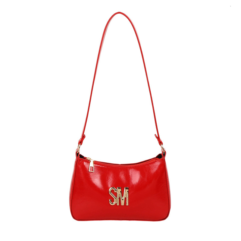 Western Women's 2025 Luxury Bag Summer New Style Texture Popular Letter Commuting Handheld New Free Delivery Designer Bag Crossbody Bag Trend