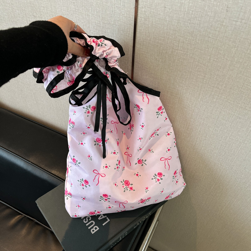 2025 New Sweet And Cute Folded Shoulder Summer Small Fresh Wave Point Bow Luxury Bag Cloth New Free Delivery Designer Bag Commuter Bag For Women