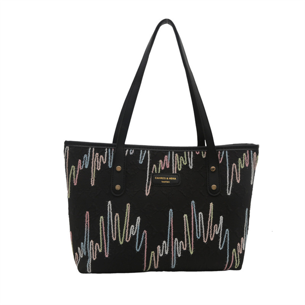 Handheld large capacity tote for women in autumn and winter 2025, new color blocking casual striped versatile high-end shoulder bag