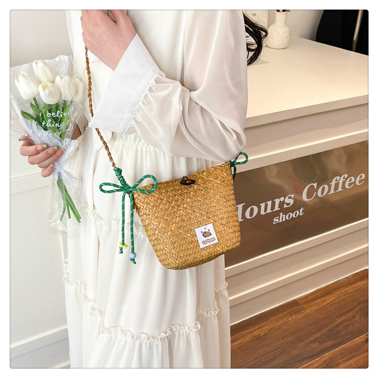 New straw woven lazy casual fashion versatile women's single shoulder crossbody bag beach vacation woven bag solid color simple single shoulder c