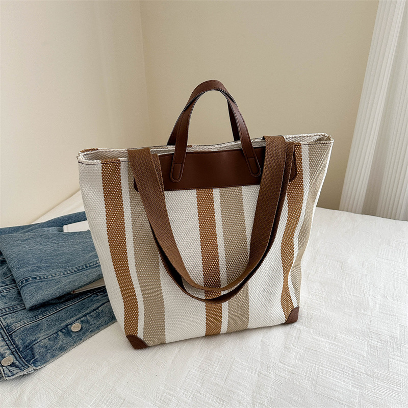 Free Delivery Designer Bag Large Hand For Women In Winter 2025 Fashionable Contrasting Striped Canvas Hand Commuting Tote Single Shoulder Armpit Luxur