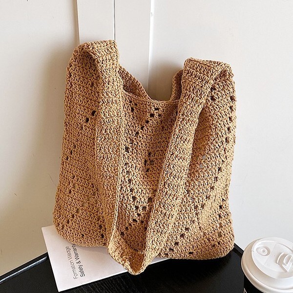 New French style artistic hollow weaving large capacity tote bag crochet shoulder bag fairy vacation handheld beach bag lazy and simple designer shoul
