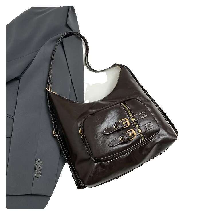 Top brand new free delivery designer bag women's new bag high-end feeling university style student shoulder bag with needle decoration buckle mot