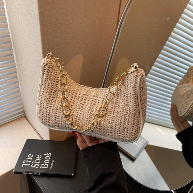 Summer New New Free Delivery Luxury Bag Designer Bag Versatile Fashion Grass Weaving Stick Underarm Simple Artistic Single Shoulder Handheld Crossbody