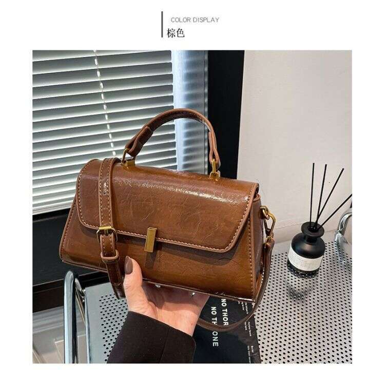 High end feeling light luxury popular hand-held small square bag 2025 new item niche fashion versatile women's crossbody bag trend