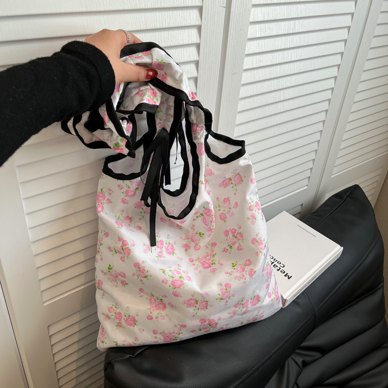 2025 New Sweet And Cute Folded Shoulder Summer Small Fresh Wave Point Bow Luxury Bag Cloth New Free Delivery Designer Bag Commuter Bag For Women