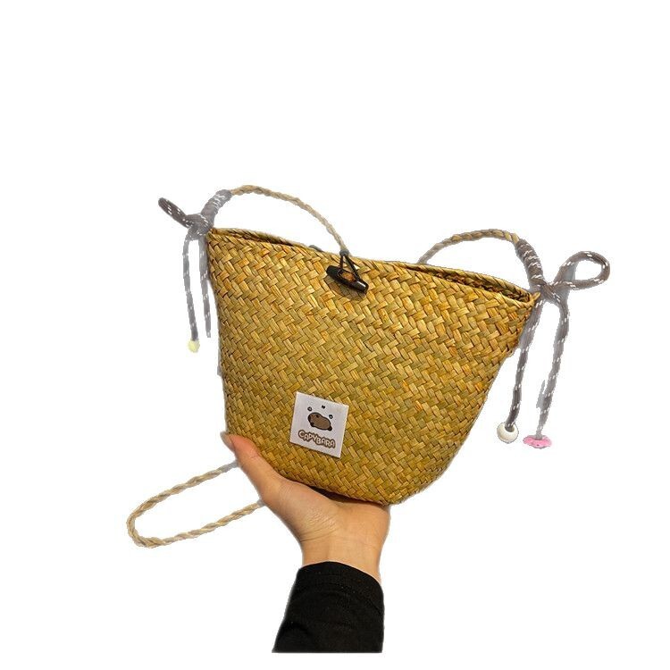 New straw woven lazy casual fashion versatile women's single shoulder crossbody bag beach vacation woven bag solid color simple single shoulder c